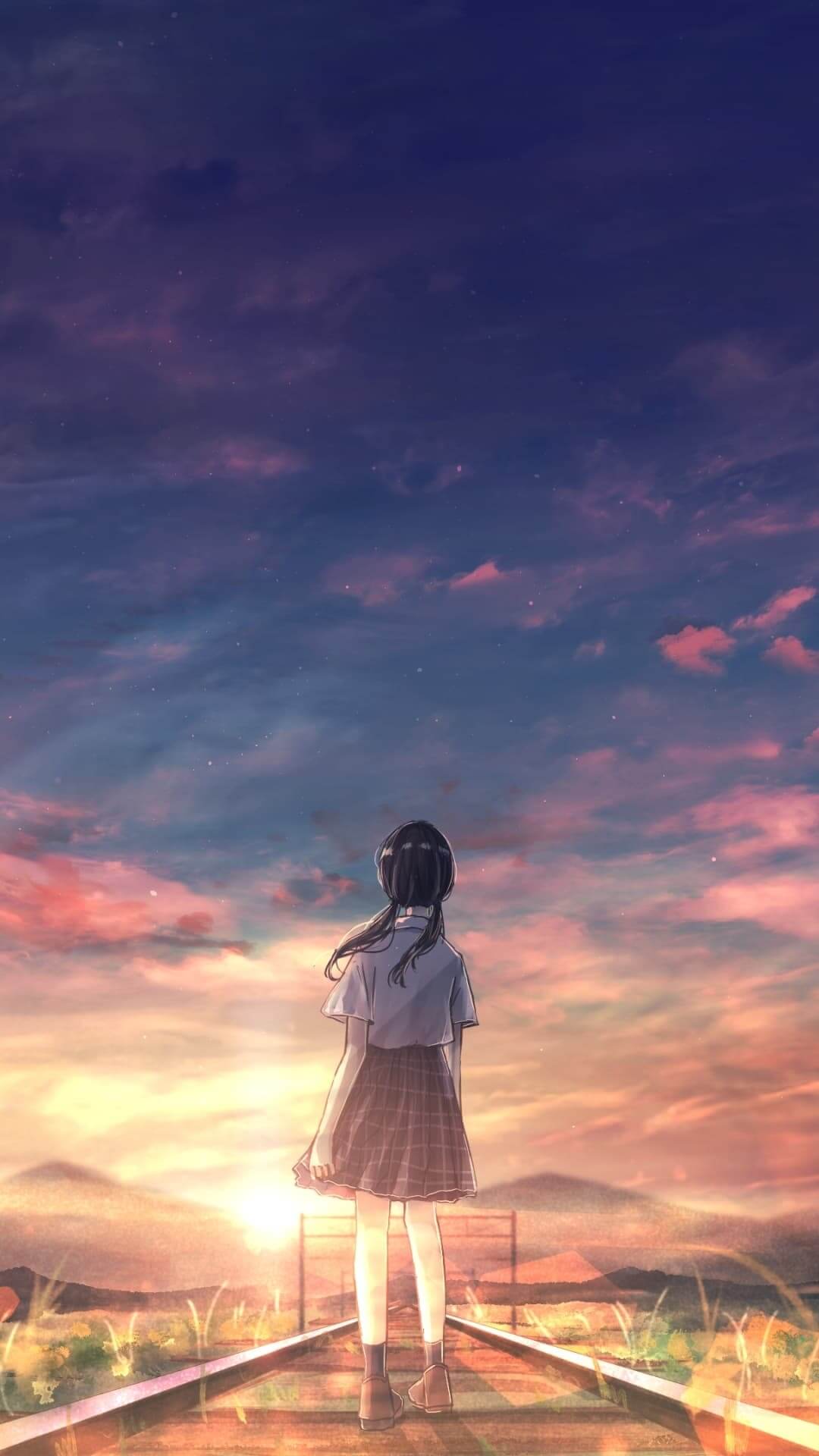 Girl gazes into vibrant sunset, standing on railroad tracks with mountains backdrop. anime wallpaper, 4K