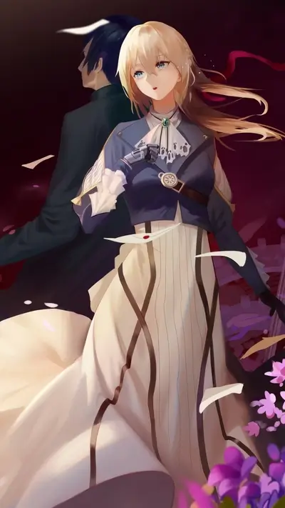 A blonde woman in a flowing dress stands with a man