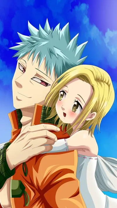 A boy and a girl embrace affectionately