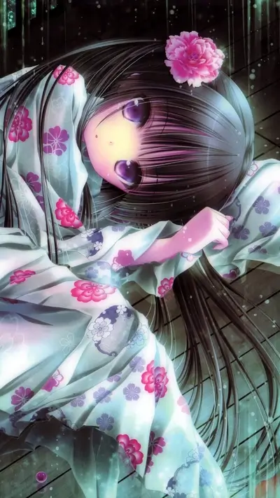 A girl in a floral kimono, lying down