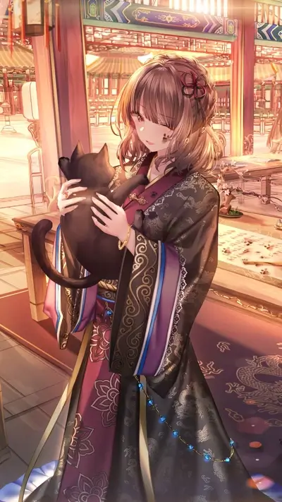 A girl in a kimono holding a black cat