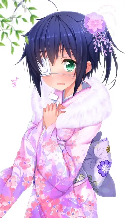 A girl in a pink kimono with a flower in her hair