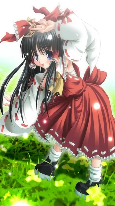 A girl in a red dress in a field