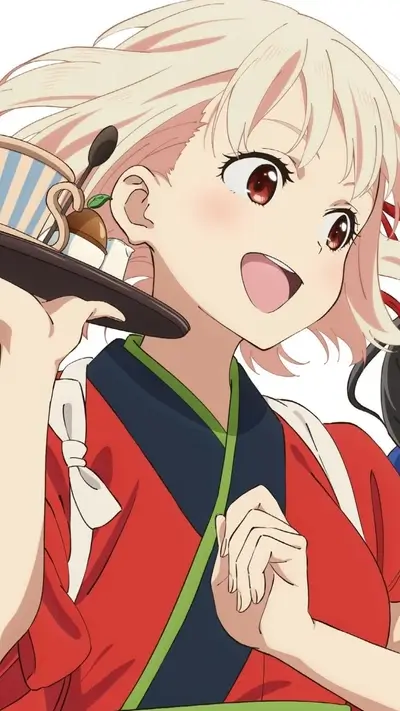 A girl in a red kimono serves a dessert