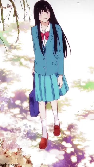 A girl in a teal uniform walking