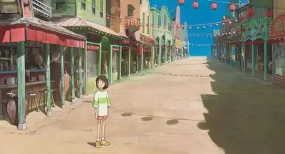 A girl stands on a deserted street lined with colorful buildings