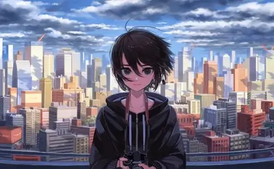 A girl with a camera overlooking a city