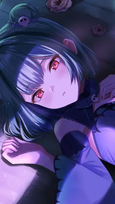 A girl with dark hair and red eyes lies on her side
