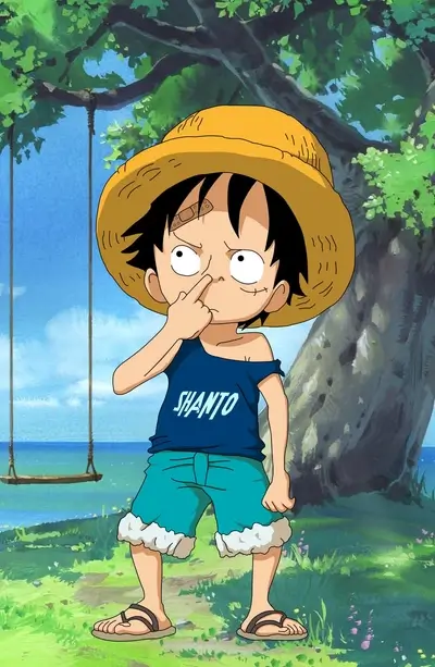 A small child with a straw hat, band-aid, and a blue shirt