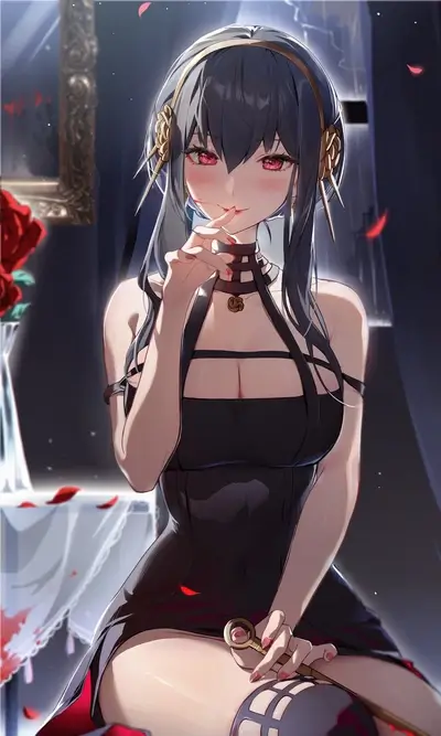 A woman in a black dress, red roses in the background