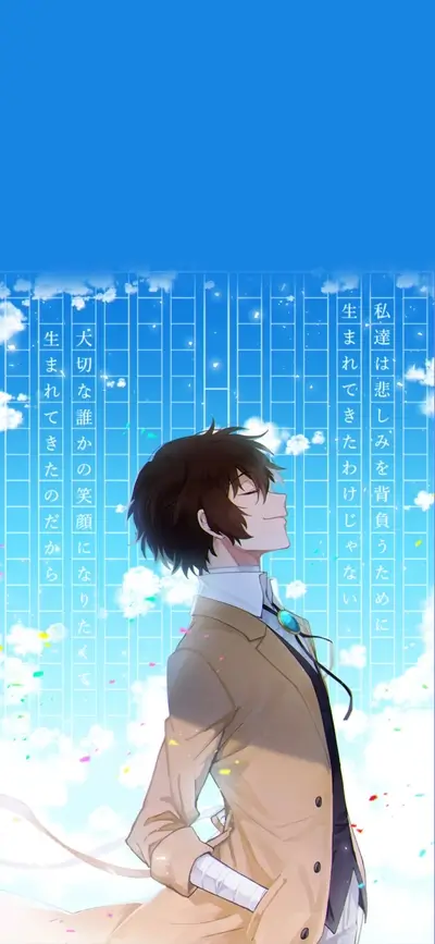 A young man in a beige coat stands against a blue sky