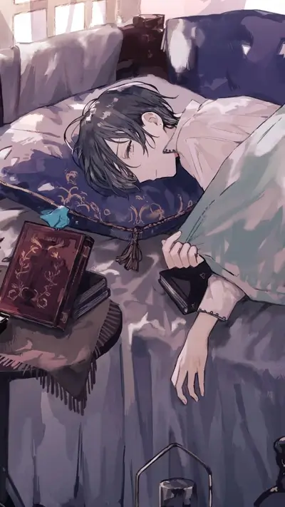 A young man sleeps soundly in bed, books nearby