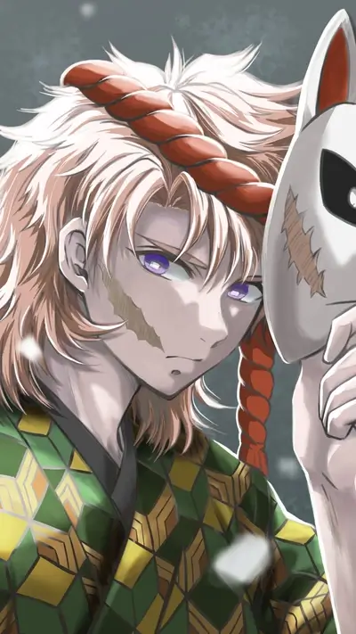 A young man with blond hair holds a mask
