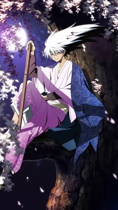A young man with long white hair sits on a tree branch