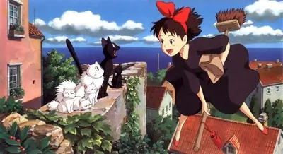 A young witch flies on a broom over a coastal town