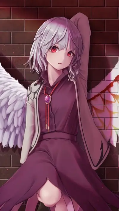Angel leaning against a brick wall
