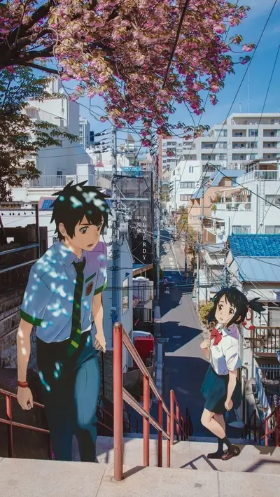 Anime characters walking up stairs in a Japanese city