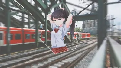 Anime girl with a pony tail, standing near a train track