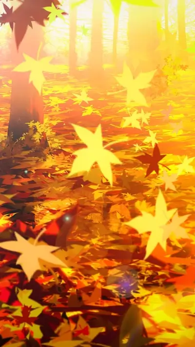 Autumn scenery with fallen leaves, tree trunks, and sunlight shining through the woods
