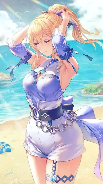Blonde girl in summer dress on beach