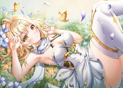 Blonde girl lying in a field of flowers