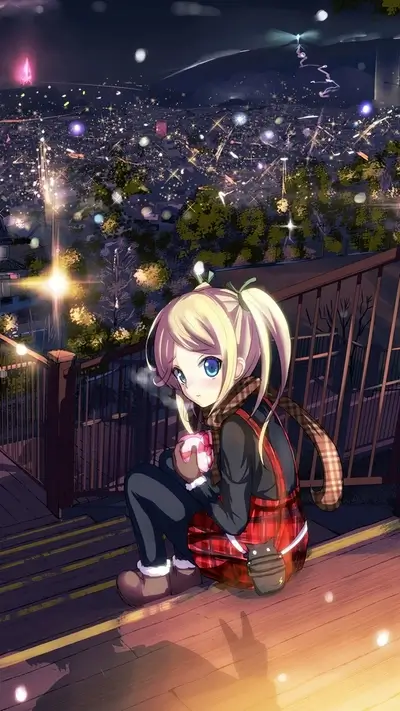 Blonde girl sitting on the stairs while enjoying the Christmas lights in the city