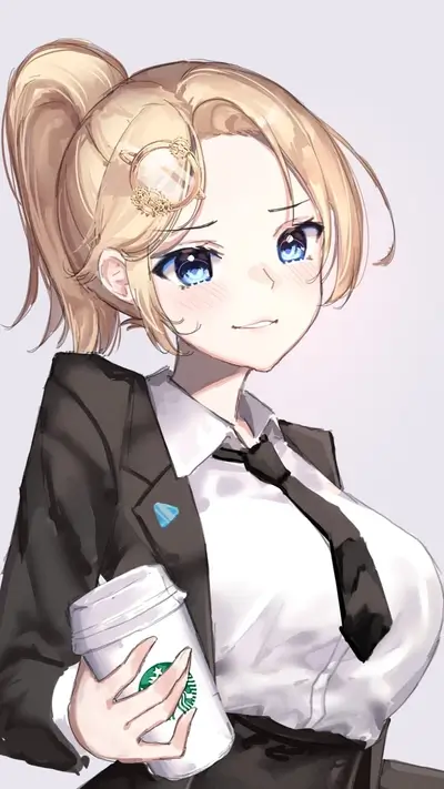 Blonde haired woman in suit holding Starbucks coffee