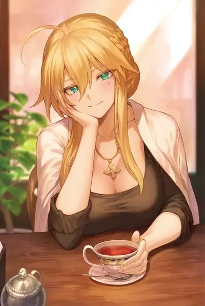 Blonde woman sits at a table, enjoying tea