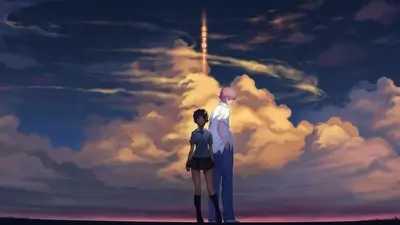 Boy and girl standing back to back under dramatic dusk sky