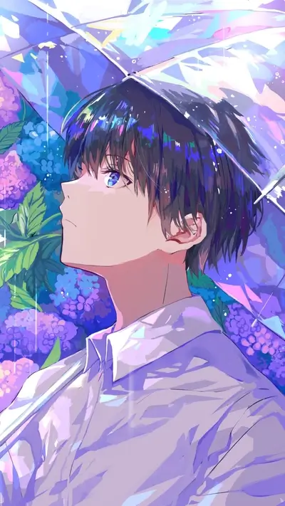 Boy gazes upward under a vibrant umbrella, surrounded by hydrangea flowers