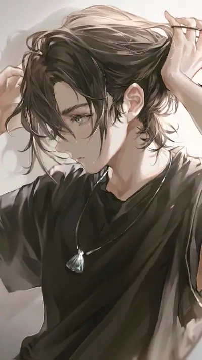Boy styling his hair, wearing a black shirt