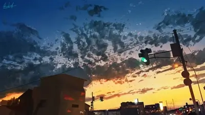 Cityscape at dusk with dynamic clouds, traffic lights, and silhouetted buildings