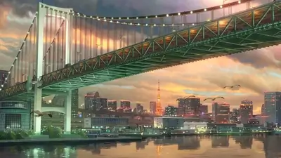 Cityscape at sunset with a bridge