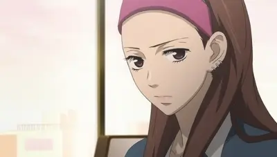 Close-up of a brown-haired girl wearing a pink headband