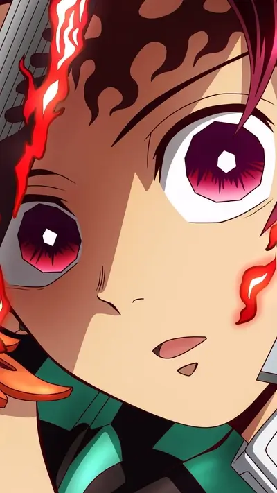 Close-up of a character's face, fiery details, and determined expression