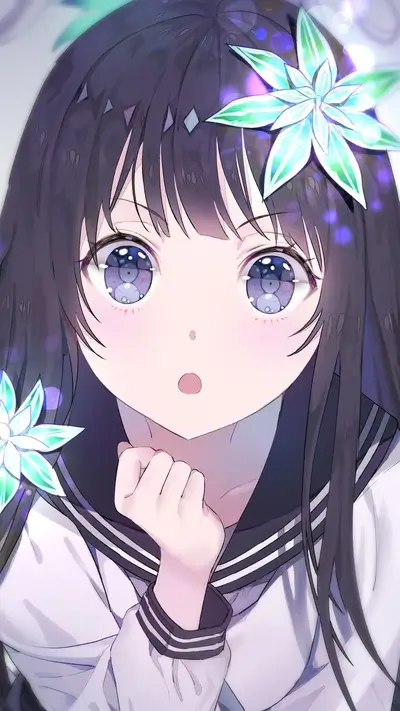 Close-up of a cute girl with flowers in her hair