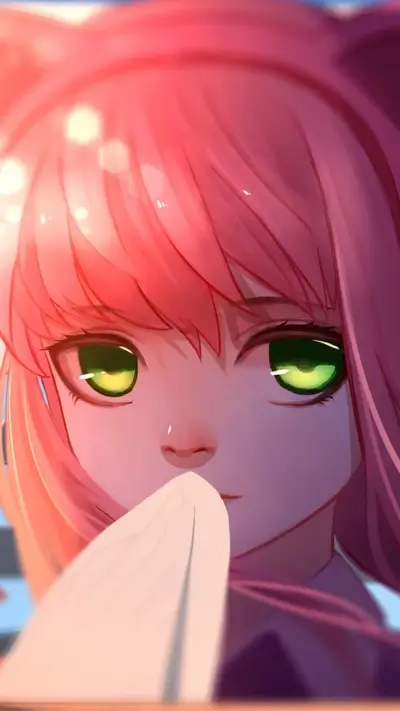 Close-up of a girl with pink hair and green eyes