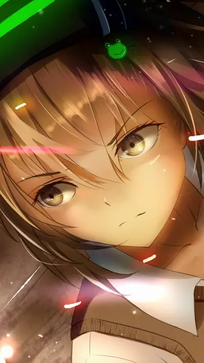 Close-up of a girl's face, brown hair, green frog pin