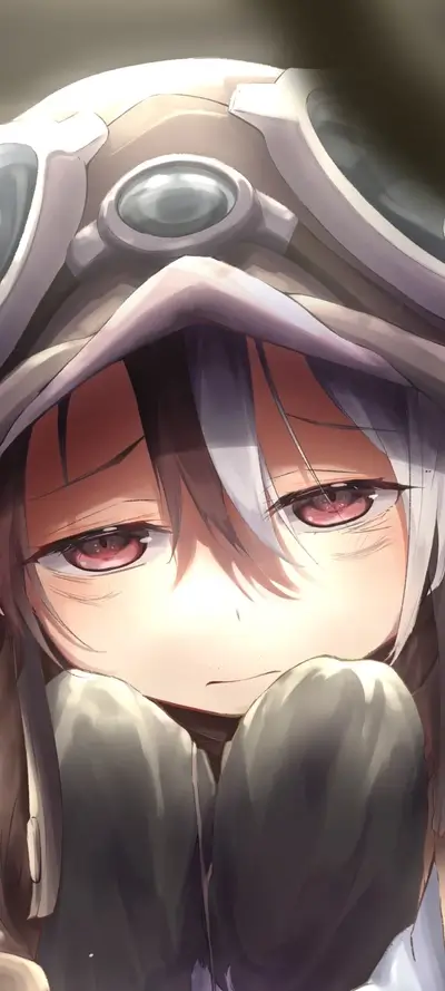 Close-up of a girl's face, wearing a hooded goggles