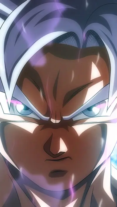 Close-up of intense Goku in Ultra Instinct form
