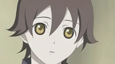 Close-up of young character with brown hair and golden eyes