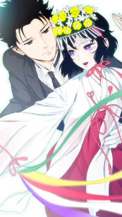 Couple in traditional Japanese attire, flowers adorn the woman's head