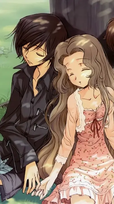 Couple sleeping together under a tree