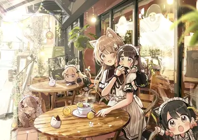 Cute cat-eared girls enjoying coffee at a cafe