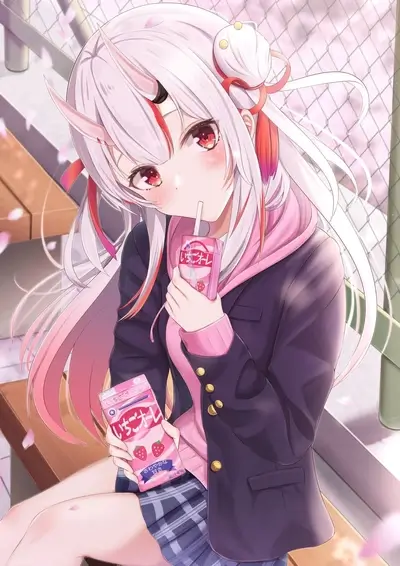 Cute girl with horns drinking strawberry milk outdoors