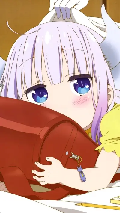 Cute girl with horns hugging a red bag