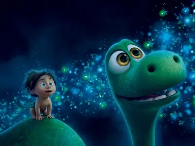 Dinosaur and boy staring in wonder at the glowing bugs, lit night