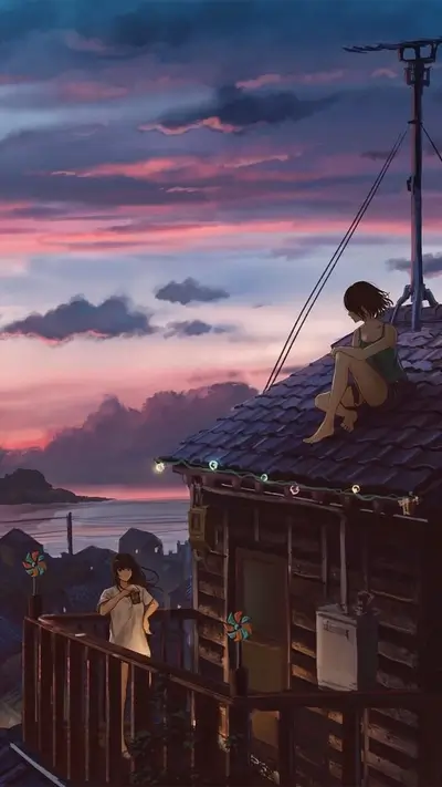 Dreamy rooftop scene with two girls and a vibrant sunset