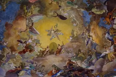 Elaborate ceiling fresco depicts allegorical figures among clouds and celestial motifs, ornate and intricate