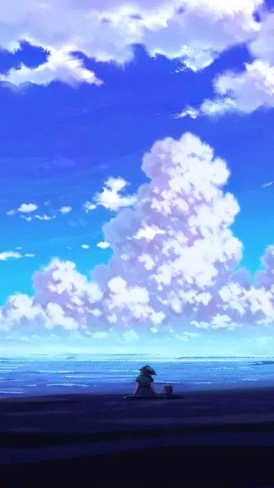 Figure at the beach looking at massive clouds in a bright sky